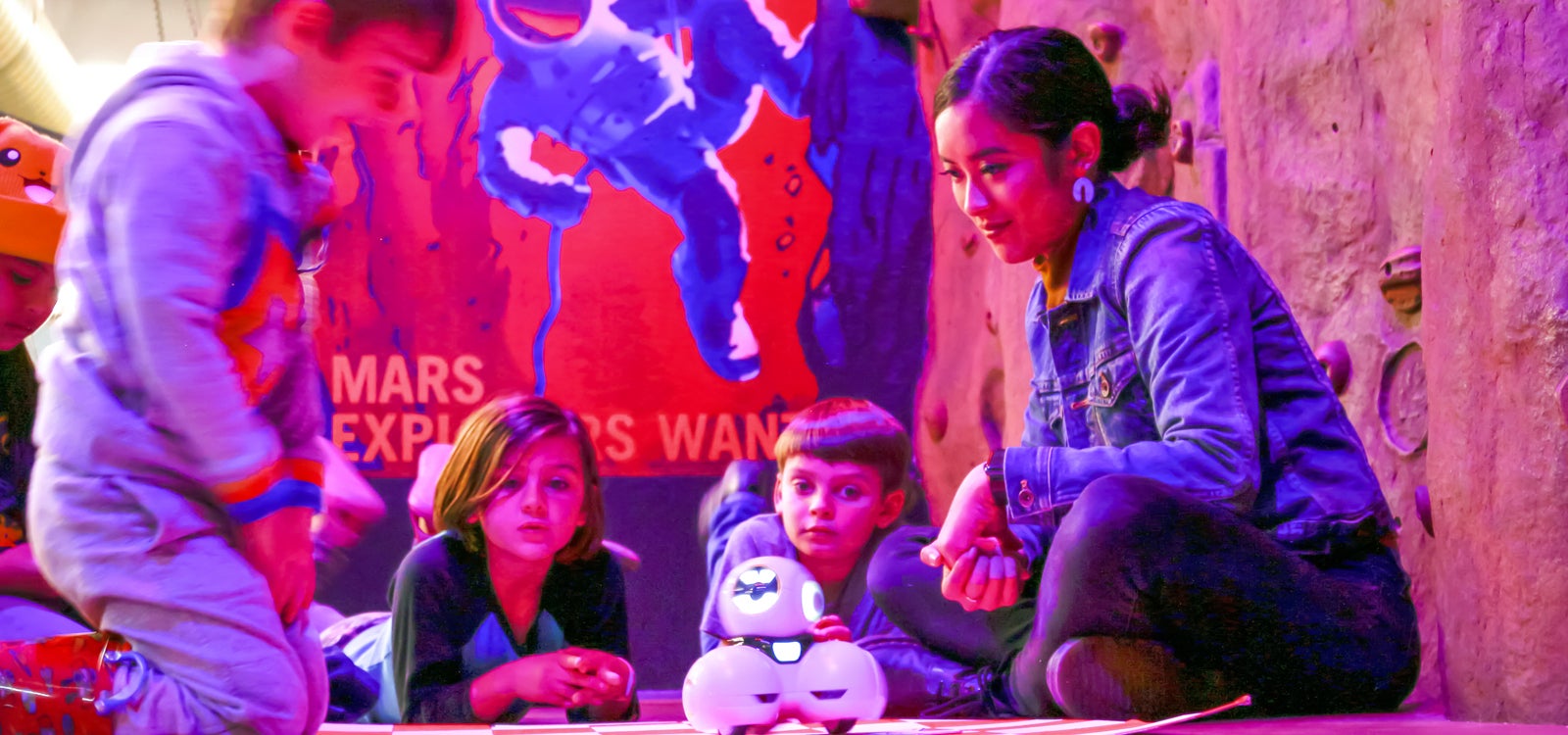 Cal Poly student working with kids