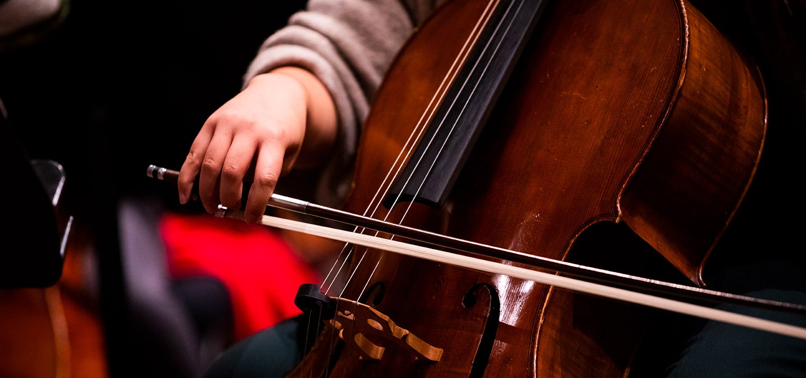 Student playing the cello