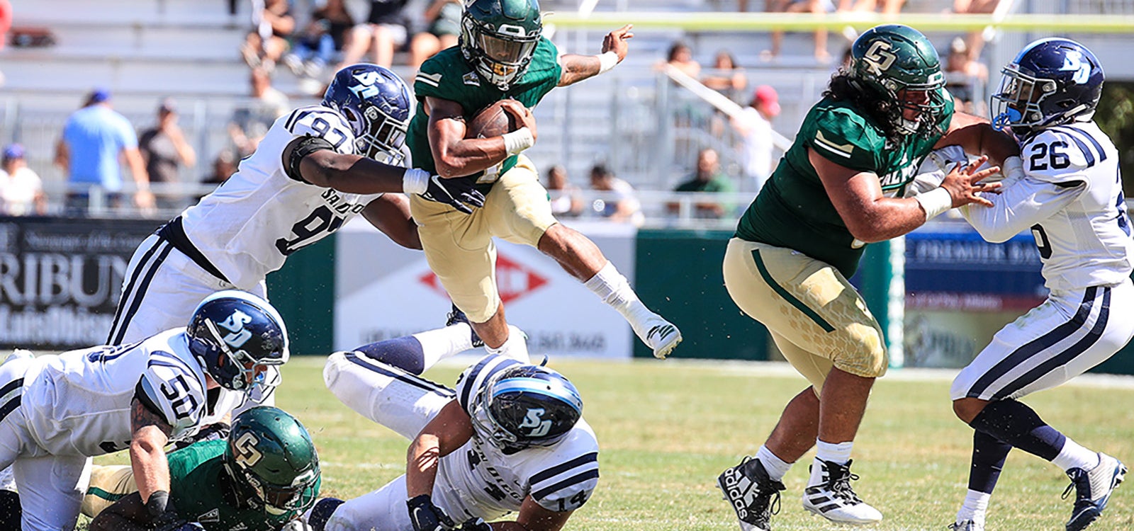 Cal Poly Football team in action during a game