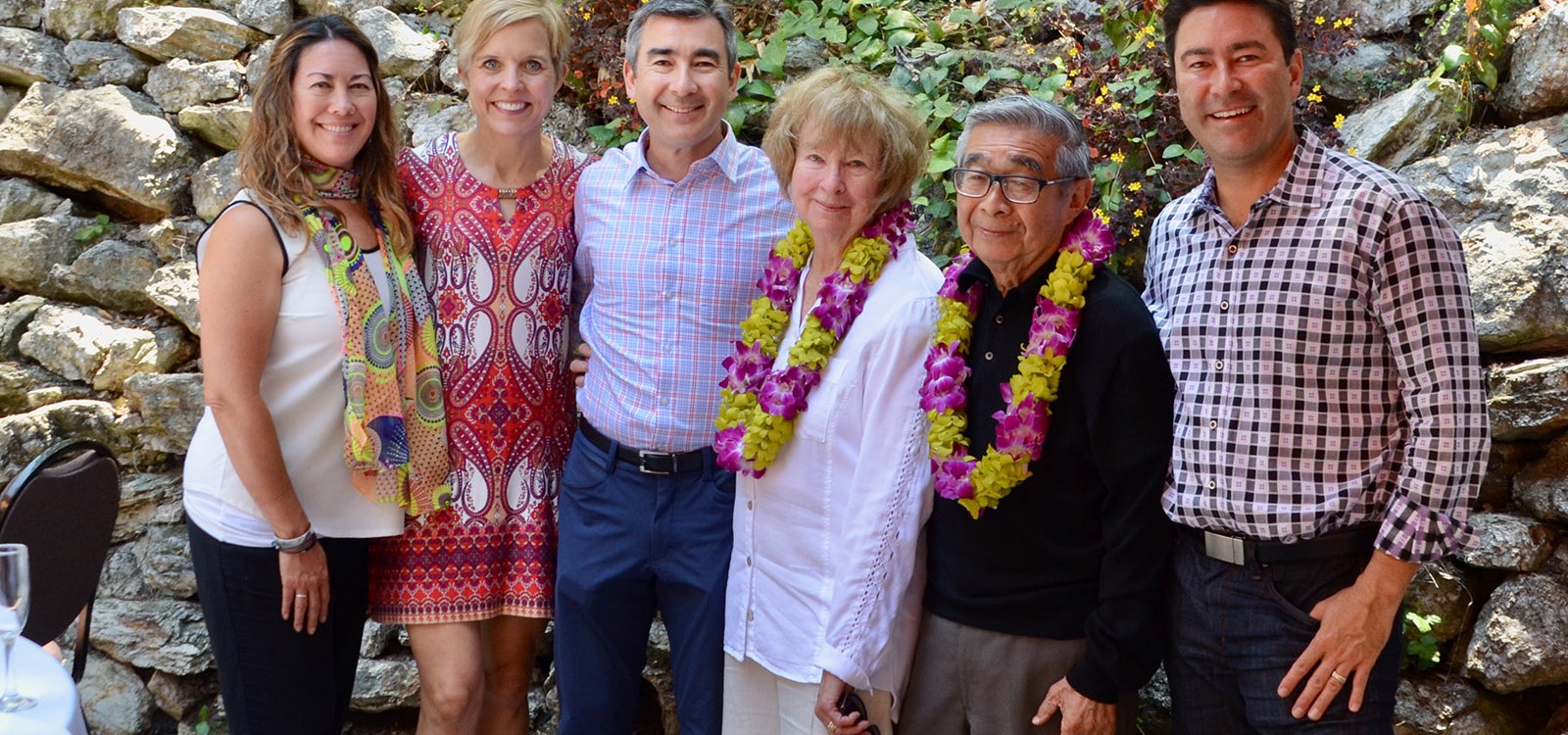 Smiling photo of six members of the Sakamoto family