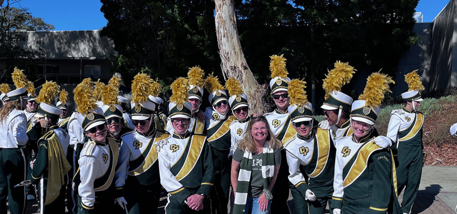 Mustang Band pose for picture. 