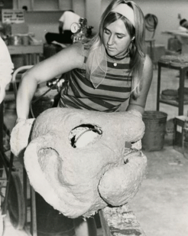 Student working on rose float