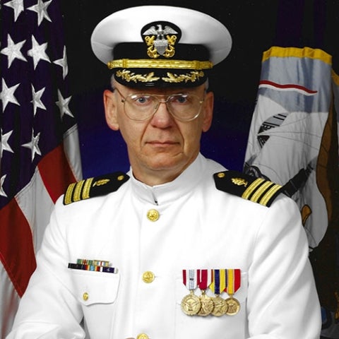Bob Thompson poses for official U.S. Navy portrait