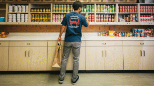 Student shopping in food pantry