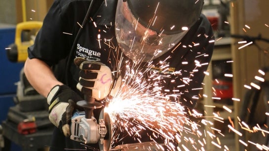 Student working in a shop