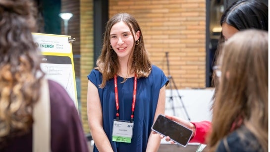 Bailey College student presenting their project at a conference.