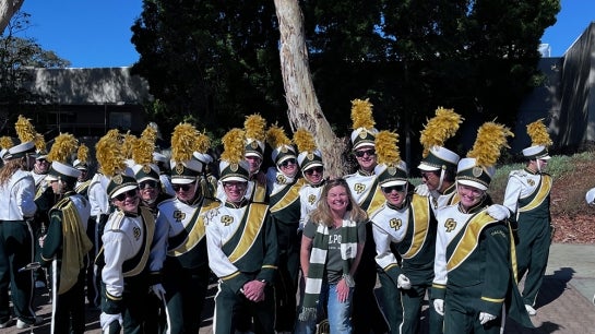 Mustang Band pose for picture.