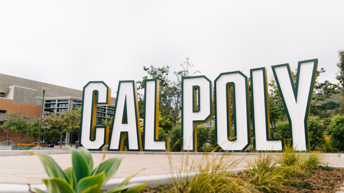 A close-to-the-ground shot of the Cal Poly letter sign