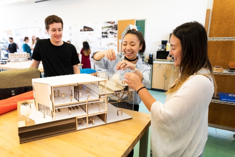 Students working on an architecture model