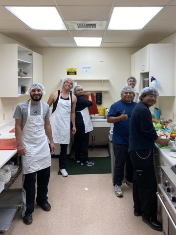 Students working in a kitchen