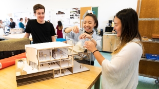 Students working on an architecture model