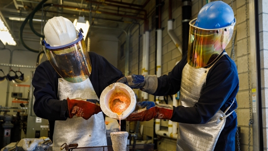 Students in a metal casting class 