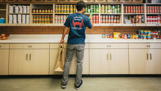 Student shopping in food pantry