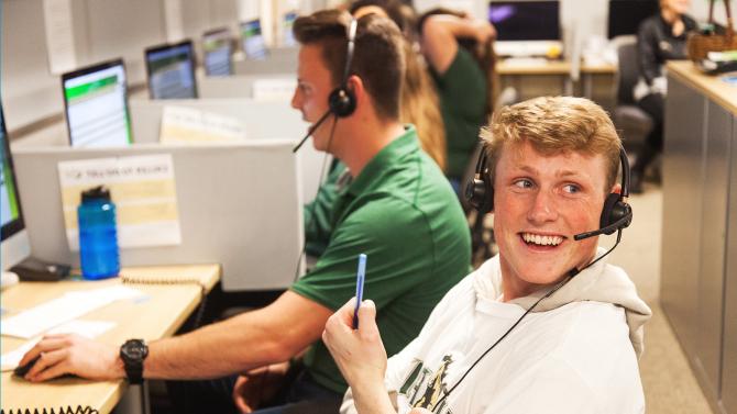 Students working in the call center 